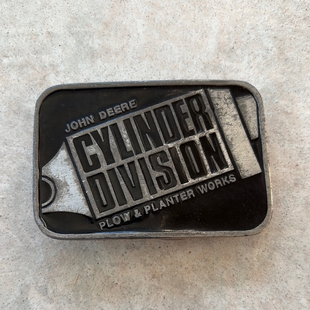 Vintage John Deere Cylinder Division Plow & Planter Works belt buckle.